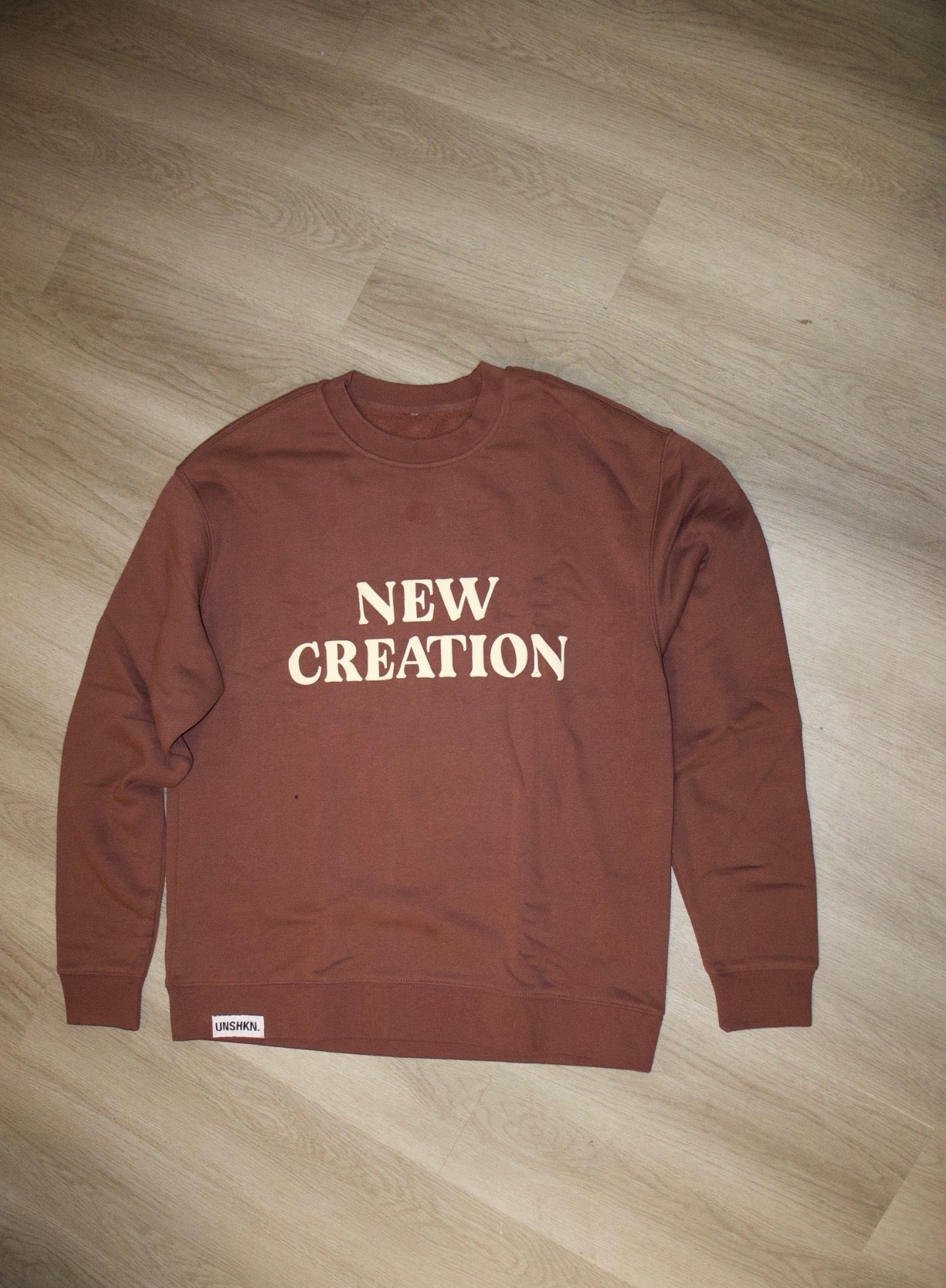 NEW CREATION BROWN CREW